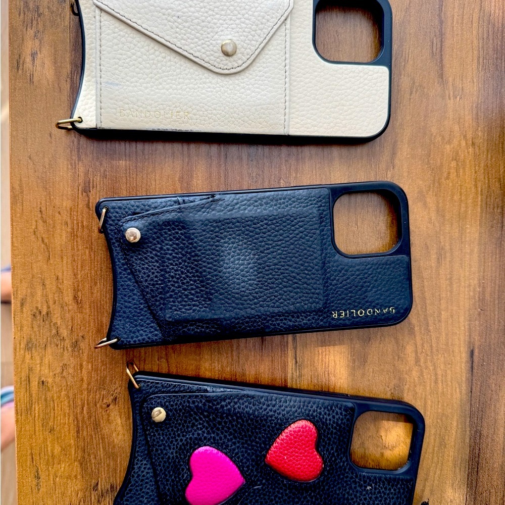 Bandolier Cream and Black Phone Cases with Leather Texture and Textured Surface